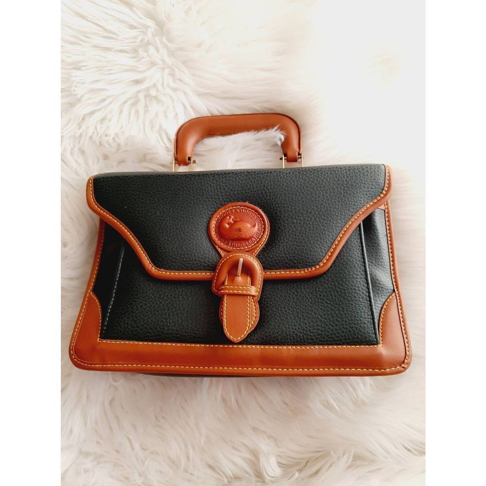 Faux D& B all weather leather hand clutch bag